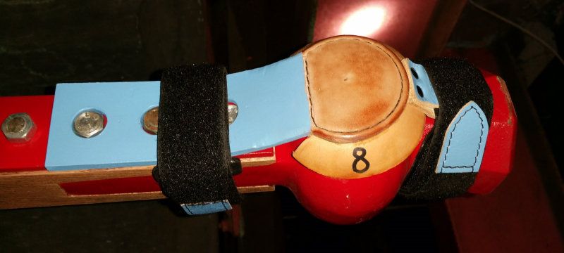 Timber shafted clapper muffle